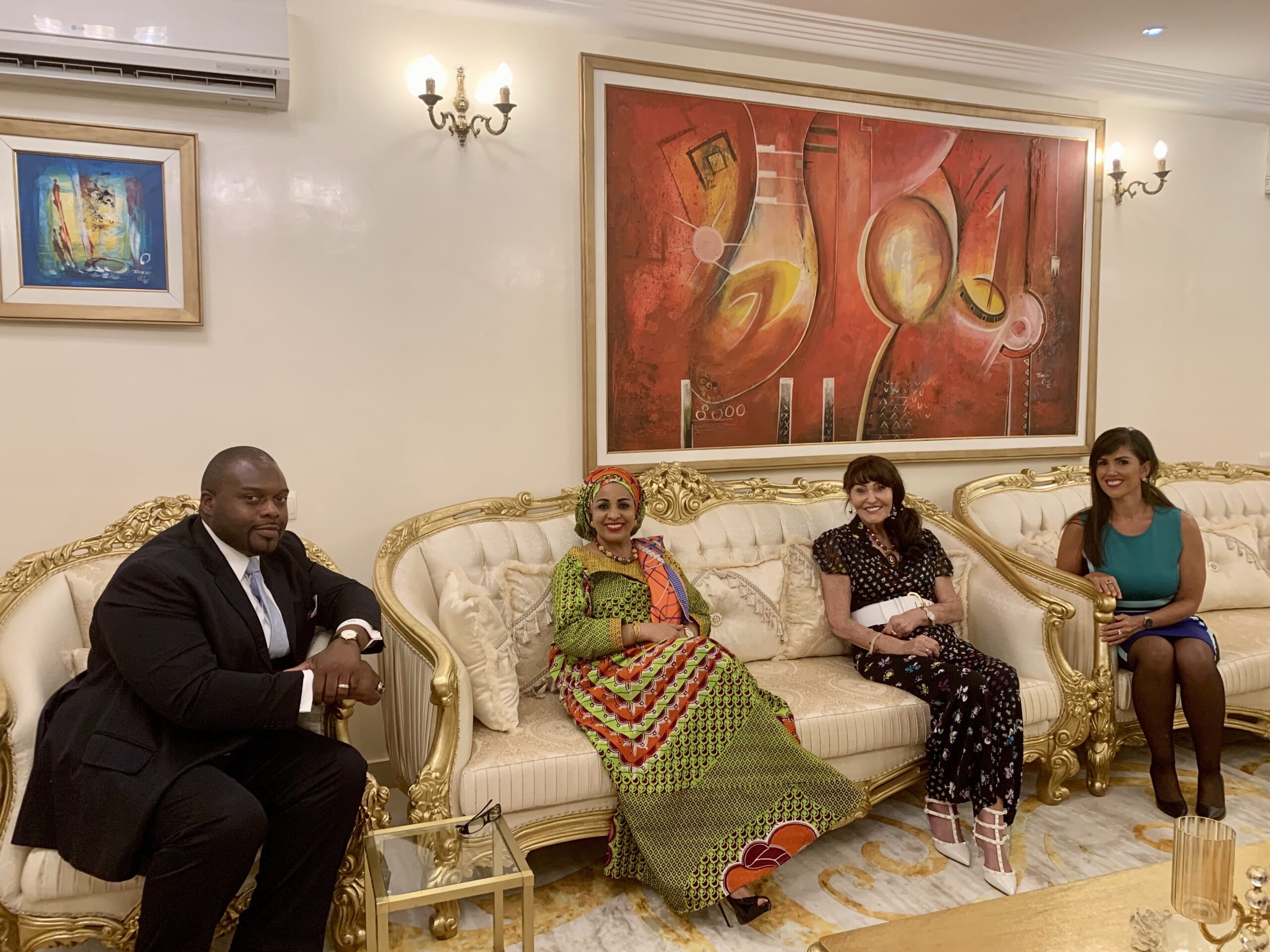 80360EED-5B11-457F-A31C-20F0842AE5E6-scaled W/U founders Mwamba, Deborah, and Hilary Devey met with H.E. Dr. Lalla Malika Issoufou in Niger. The policy in Niger to eradicate early child marriage was led by H.E. Dr. Lalla Issoufou. Hilary Devey was a featured keynote speaker at the African Union conference held that year in Niamey.